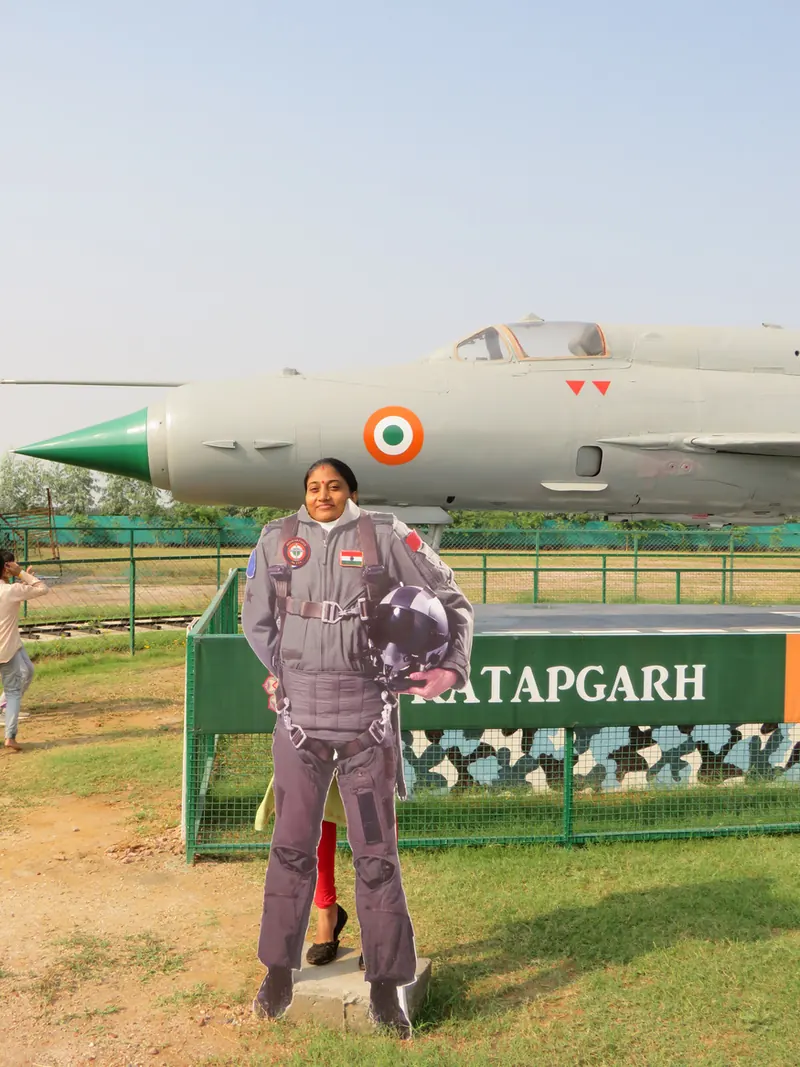 A visitor beside the MIG 21 fighter jet at the Shaurya Gatha Military Museum